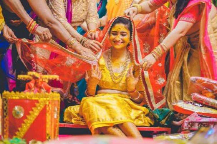 Find the best candid wedding photographer in delhi